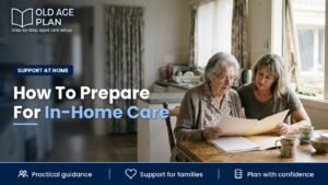 An adult daughter sitting with her elderly mother at the kitchen table as they prepare for in-home care.